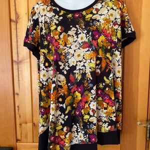 Tunic with asymmetrical hem